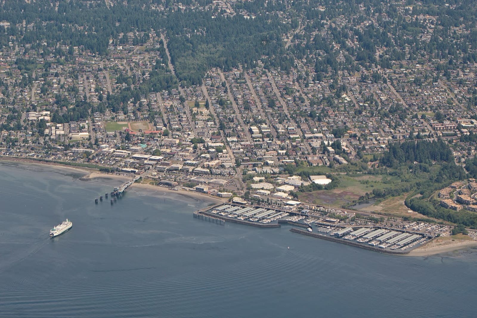 Aerial view of the Edmonds waterfront, marina and ferry on Puget Sound
