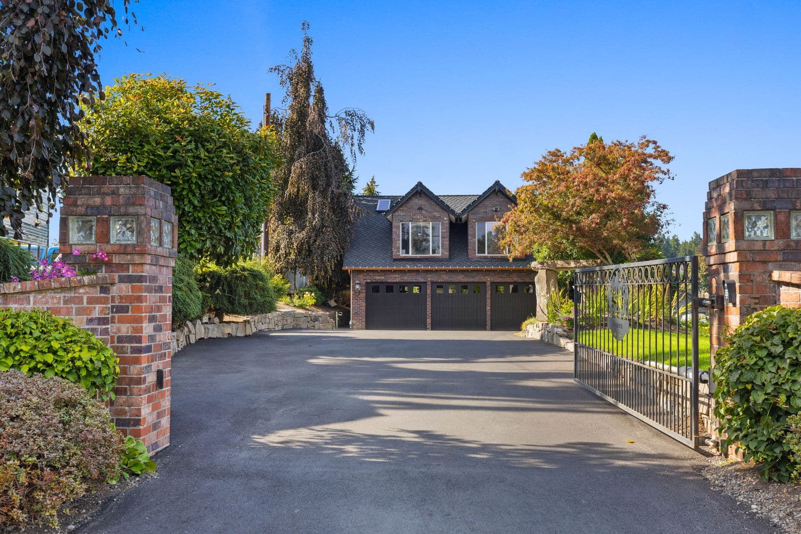 Gated entry and the newly paved driveway — 1504 E Lakeshore Dr, Lake Stevens